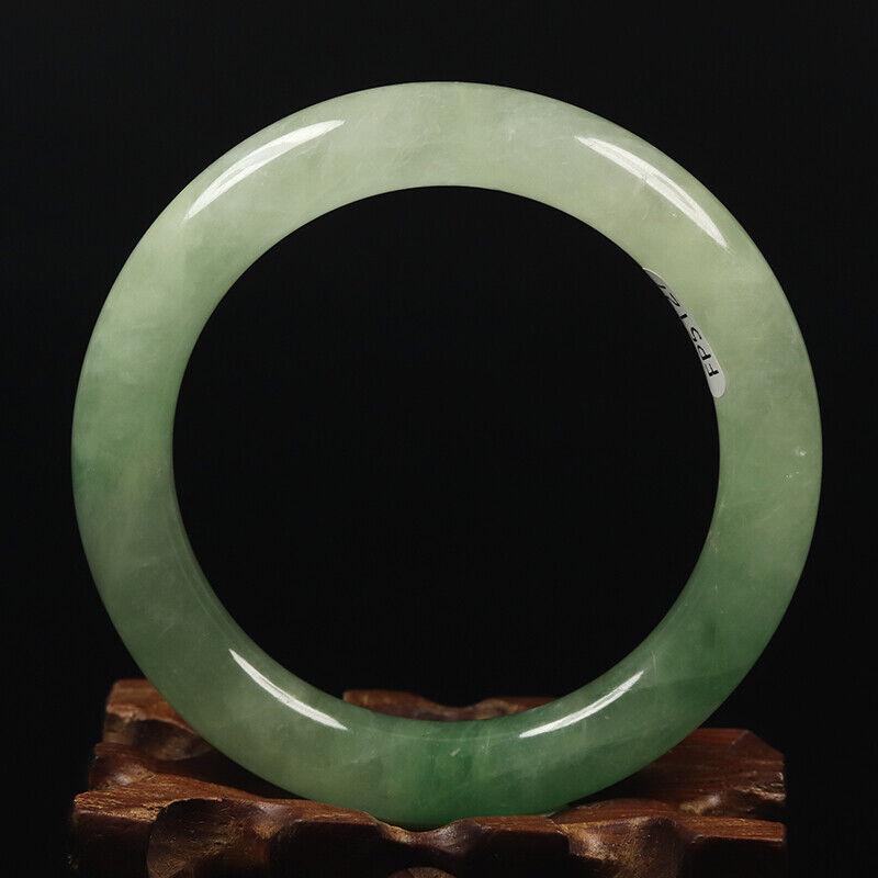Chinese natural green jade bangle: Size: Width 54 mm - Thickness 10 mm Materials: Natural jade Time Period: qing dynasty Manufactured Date: qing dynasty Origin: China