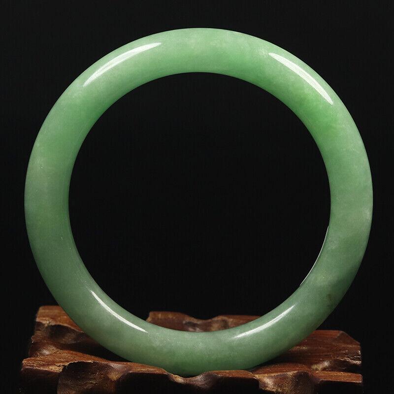 Chinese natural green jade bangle: Size: Width 55 mm - Thickness 9 mm Materials: Natural jade Time Period: qing dynasty Manufactured Date: qing dynasty Origin: China