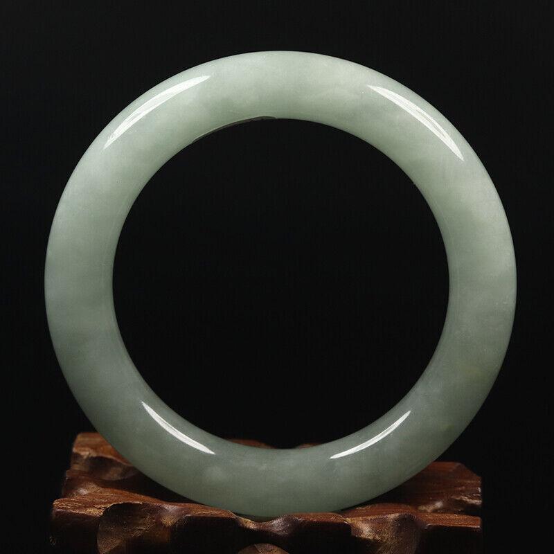 Chinese natural green jade bangle: Size: Width 56 mm - Thickness 11 mm Materials: Natural jade Time Period: qing dynasty Manufactured Date: qing dynasty Origin: China
