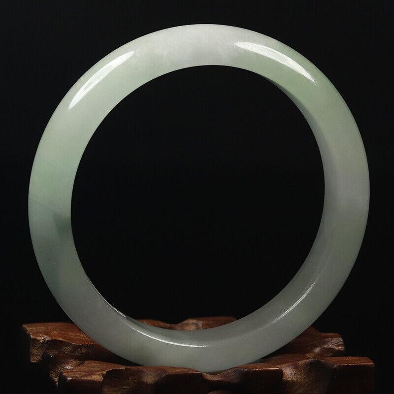 Chinese natural green jade bangle: Size: Width 61 mm - Thickness 8.5 mm Materials: Natural jade Time Period: qing dynasty Manufactured Date: qing dynasty Origin: China
