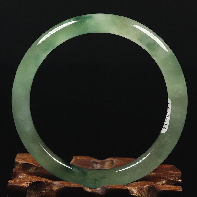 Chinese natural green jade bangle: Size: Width 57 mm - Thickness 7 mm Materials: Natural jade Time Period: qing dynasty Manufactured Date: qing dynasty Origin: China