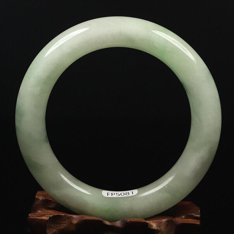 Chinese natural green jade bangle: Size: Width 60 mm - Thickness 12 mm Materials: Natural jade Time Period: qing dynasty Manufactured Date: qing dynasty Origin: China