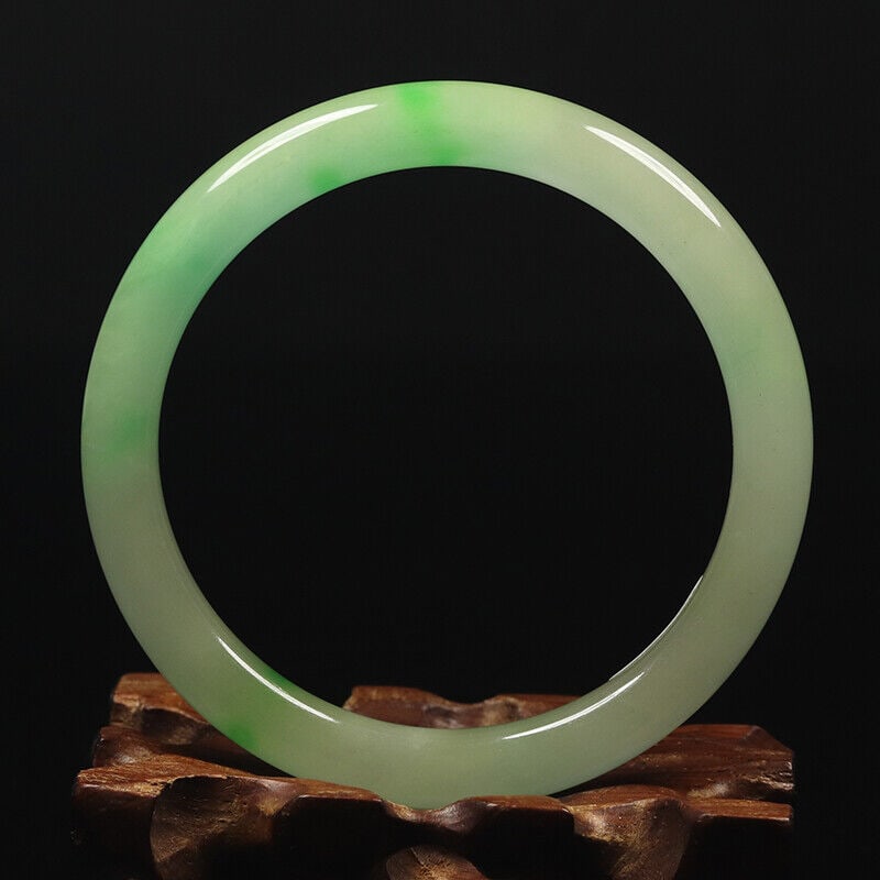 Chinese natural green jade bangle: Size: Width 56 mm - Thickness 8 mm Materials: Natural jade Time Period: qing dynasty Manufactured Date: qing dynasty Origin: China