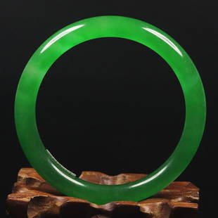 Chinese natural green jade bangle: Size: Width 56 mm - Thickness 7.5 mm Materials: Natural jade Time Period: qing dynasty Manufactured Date: qing dynasty Origin: China