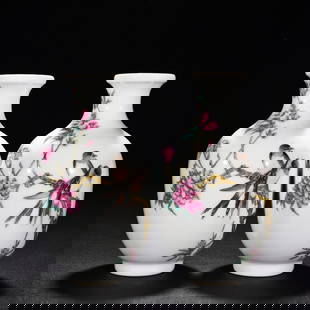 Yongzheng famille rose porcelain vase pair: Size: Height 16 cm - Width 9.5 cm Materials: Porcelain Time Period: Qing dynasty Manufactured Date: Yongzheng Mark & Period Origin: China