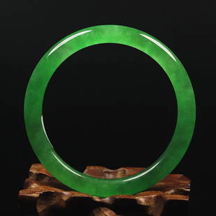 Chinese natural green jade bangle: Size: Width 57 mm - Thickness 7.5 mm Materials: Natural jade Time Period: qing dynasty Manufactured Date: qing dynasty Origin: China