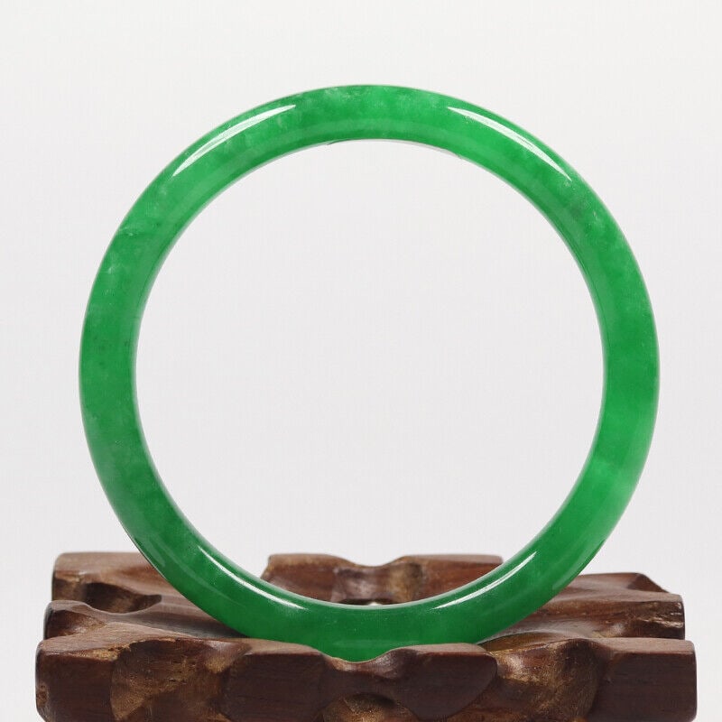 Chinese natural green jade bangle: Size: Width 51 mm - Thickness 6 mm Materials: Natural jade Time Period: qing dynasty Manufactured Date: qing dynasty Origin: China