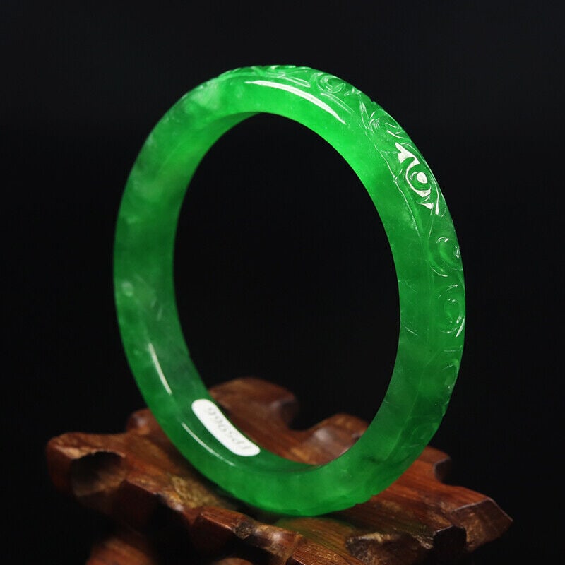 Chinese natural green jade bangle: Size: Width 57.5 mm - Thickness 7.5 mm Materials: Natural jade Time Period: qing dynasty Manufactured Date: qing dynasty Origin: China