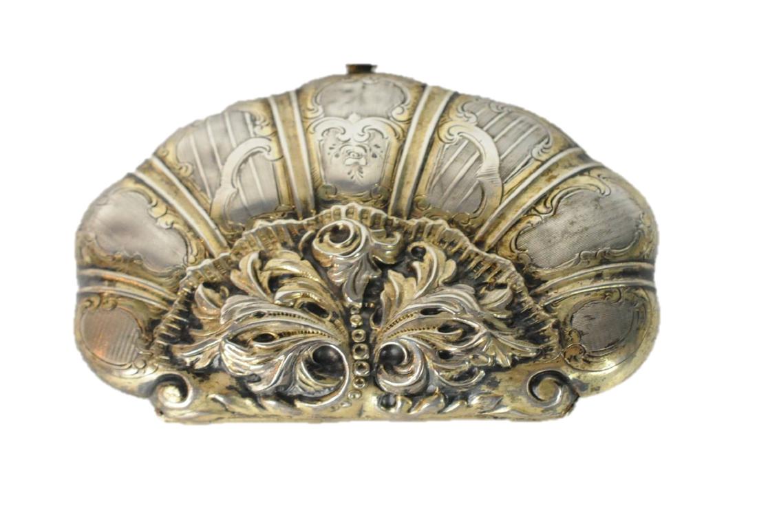 Antique Silver Repousse Change Purse: Antique silver 31.1 grams, repousse, with etched hinge change purse, fabric lining and push button closure. Measures: 2.75" L x 2" H. Condition: Several small dents due to use. Please examine all phot