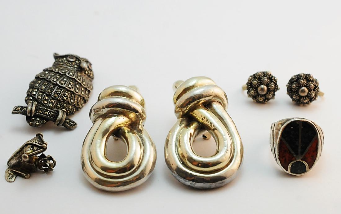 Sterling Silver Jewelry Lot Ring, Earrings &: Brooch Sterling Silver Jewelry Lot with Ring, Earrings, Brooch. Modernist earrings. Men's turquoise and coral ring, sterling silver canatille screw-back earrings, frog charm, marcasite Owl Brooch with