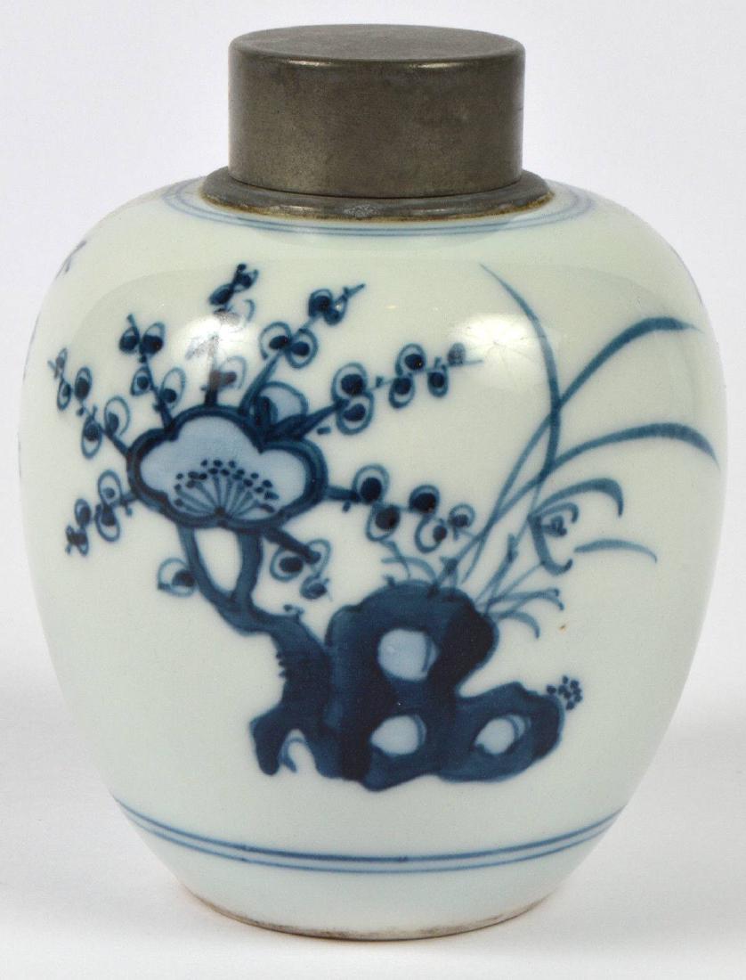 Vintage Blue & White Ginger Jar: Vintage ginger jar in white porcelain with a blue Asian floral pattern. Pewter lid. Size: 4"H. Please examine all photos closely. Contact C. Biddle Auction Gallery for more detailed information. C. Bi
