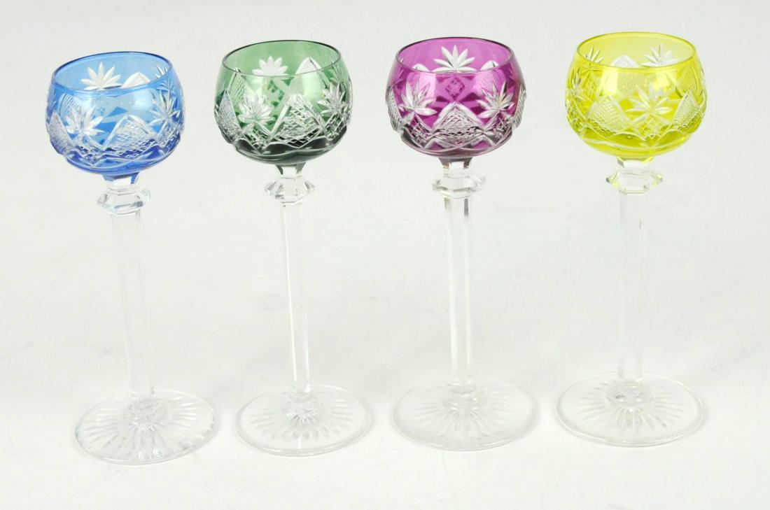 4 Czech Cut to Clear Cordial Glasses in 4 Colors: 4 Bohemian Czech Cut to Clear Cordial Glasses in four different colors- yellow, green, blue, purple. Measures: 2"D x 5.25" H. Condition: Very Good. Please examine all photos closely. Contact C. Biddle