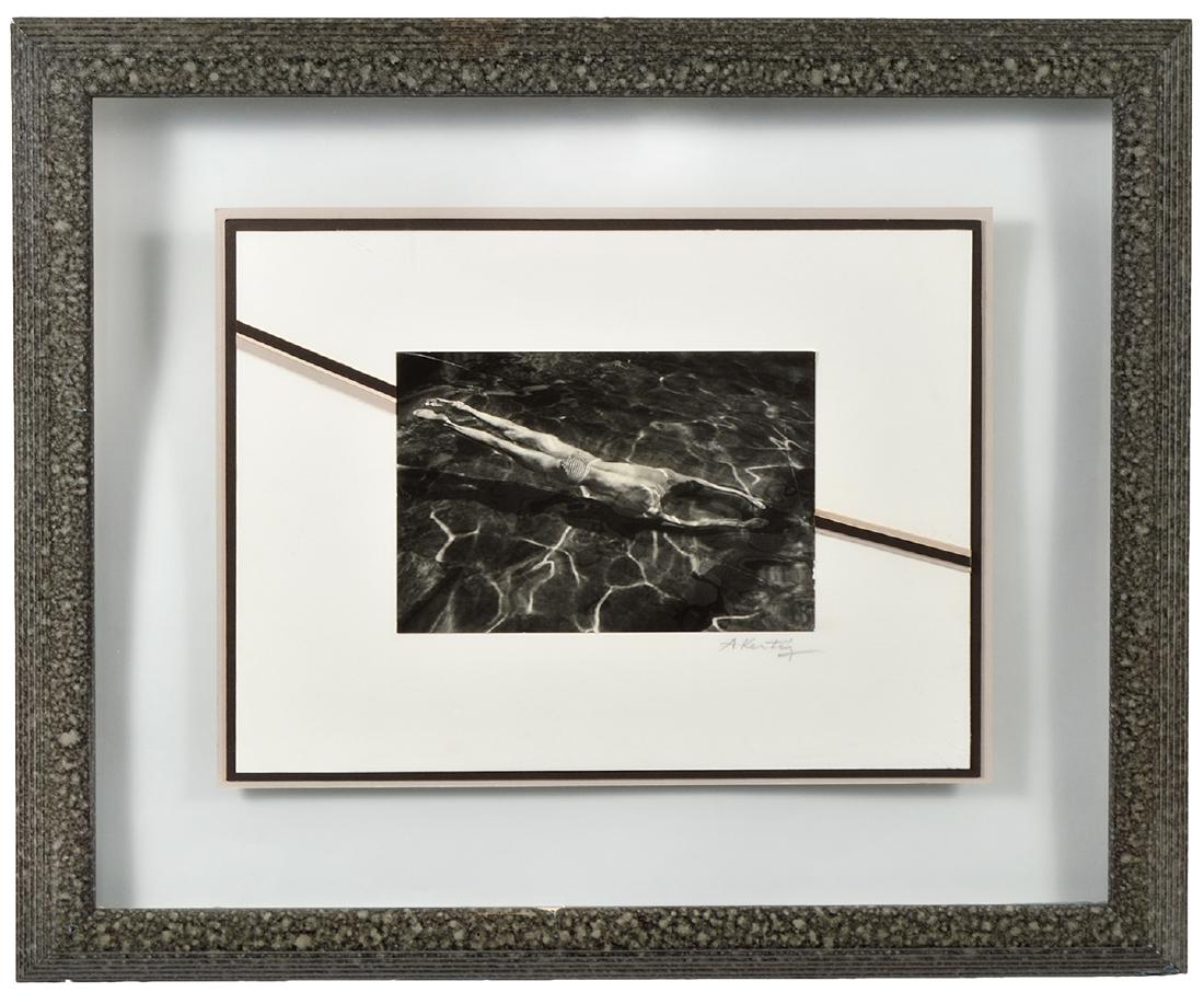 Andre Kertesz 'Underwater Swimmer' Print: Andre Kertesz Print (possibly gelatin). 'Underwater Swimmer'. Signed on matting underneath photo. I cannot see the back of the photo based on the matting. Measures: about 6.75" H x 9.75" W. Framed nea