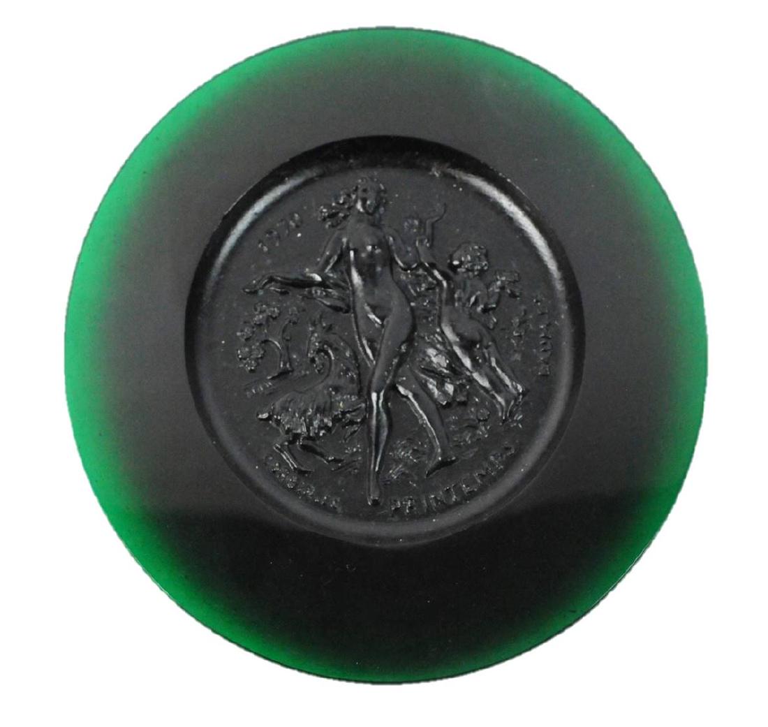 Daum Pate De Verre Le Printemps Decorative Plate: Pate de Verre green plate by Daum, 4 Seasons Plate: Spring. Measures: 10.25"D. Condition: Very Good. Please examine all photos closely. Contact C. Biddle Auction Gallery for more detailed information.