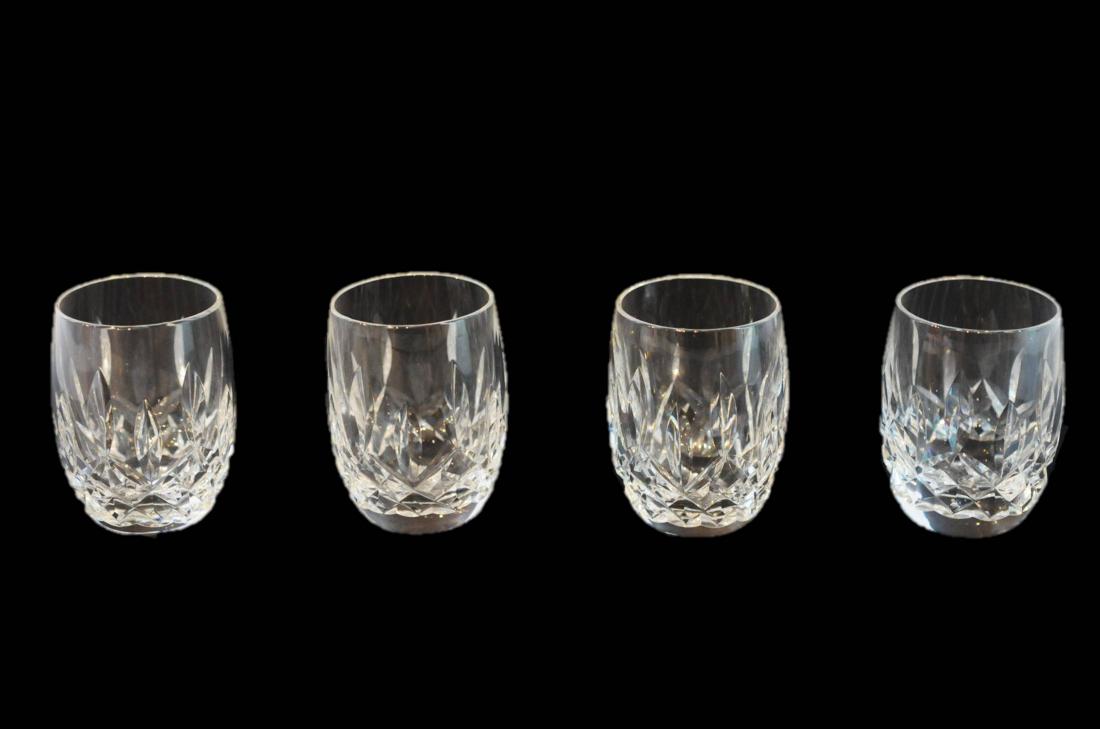 4 Waterford Clear Glass Crystal Shot Glasses: 4 Waterford Clear Glass Crystal Shot Glasses. Measures: 2.75" D x 2.5" H. Condition: Excellent no chips. Please examine all photos closely. Contact C. Biddle Auction Gallery for more detailed informat