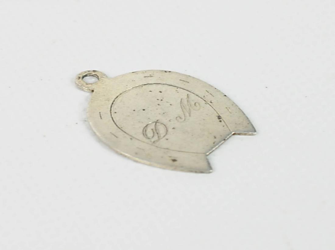 Tiffany & Co vintage Horseshoe Charm Sterling: Tiffany & Co sterling silver vintage horseshoe charm. Monogrammed. Weight: 2.8 grams Size: 1"H x .75" W. Condition: Needs polishing, surface scratches. Please examine all photos closely. Contact C. Bi