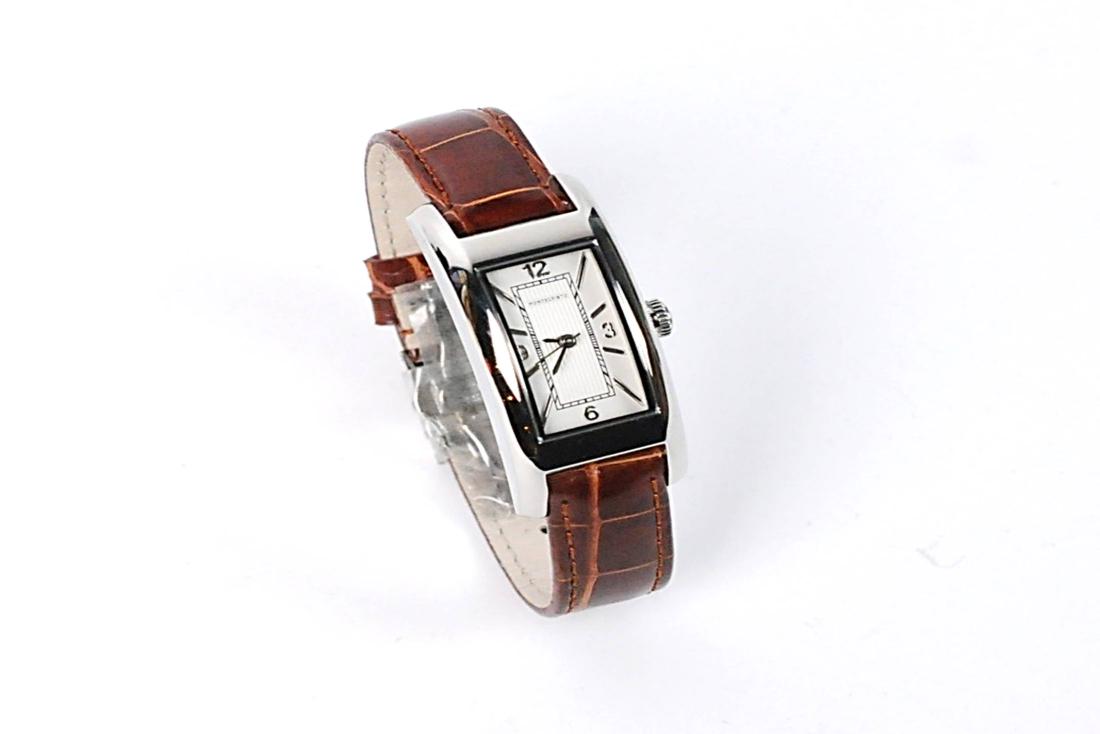 Montecristo Woman's Watch NEW: Montecristo woman's wrist watch. Silver tone with sapphire crystal and brown genuine alligator adjustable band. Water resistant to 165 feet. Condition: New in original box. Orrefors Clear Crystal Cand