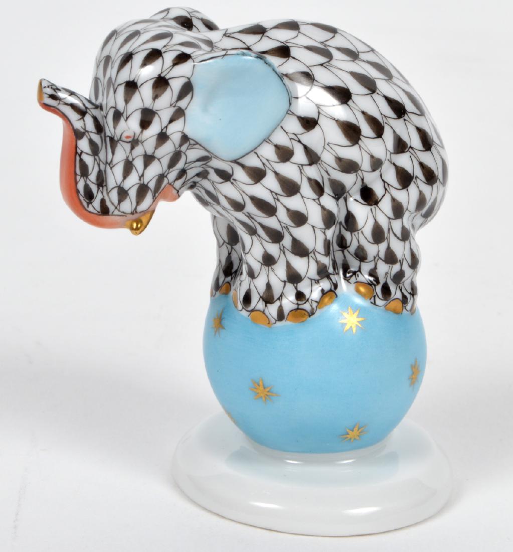 Herend Elephant Ball Vieux Black Fish Net Fiqurine: Herend Elephant on Ball figurine is painted in Vieux Herend 5215/VHN 5 F96 Black Fish Net design. This fishnet or fish scale pattern is a typical motif of Herend. 2.5" H X 2.5" L. Condition: Very good