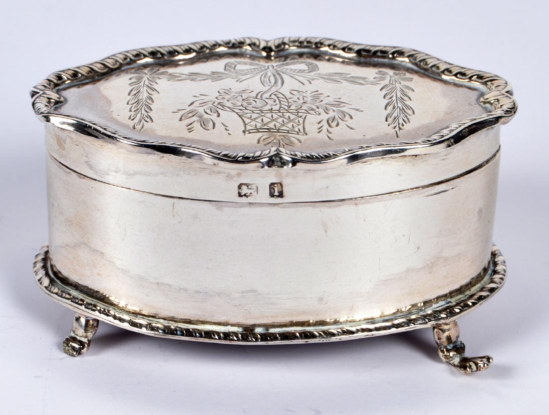 Birmingham Sterling Silver Box: John Thompson & Sons, Birmingham sterling silver footed box with repoussee lid and purple lining. 2.5"L x 1.50"W x 1"H. Fully Hallmarked. Total Weight: 32.1 grams. Condition: Good, the tip of one foot
