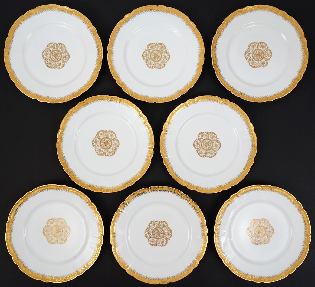 8 Haviland Tyndale & Mitchell Dinner Plates: 8 Haviland for Tyndale & Mitchell white porcelain plates with gold trim and accents. 9.5"D. Condition: Very good, no chips or cracks. Please examine all photos closely. Contact C. Biddle Auction Galle