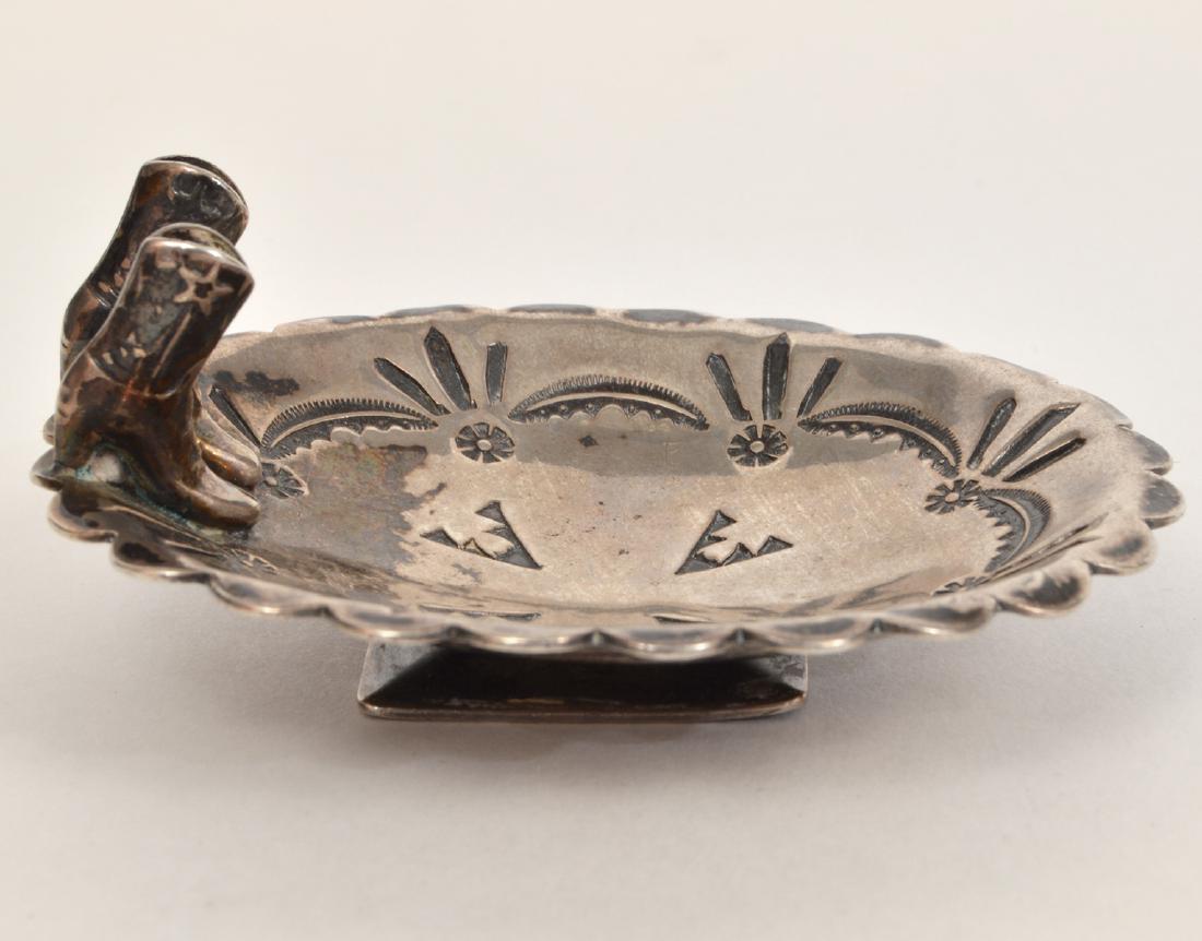 Vaughn's Sterling Silver Concho Boots Dish: Vaughn's sterling silver conch trinket dish with tiny cowboy boots on one end. Signed on bottom. 2.5"L x 2.25"W. Condition: Very Good - no issues. Please examine all photos closely. Contact C. Biddle