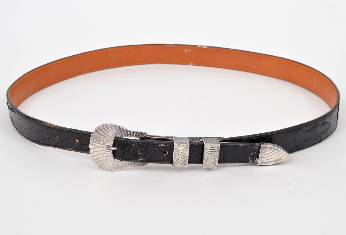 Lucchese Black Leather Sterling Silver Belt: Lucchese black belt with sterling silver buckle, end cap and loop holders. Size: 36. Condition report: Good - some wear on edges. Please examine all photos closely. Contact C. Biddle Auction Gallery f