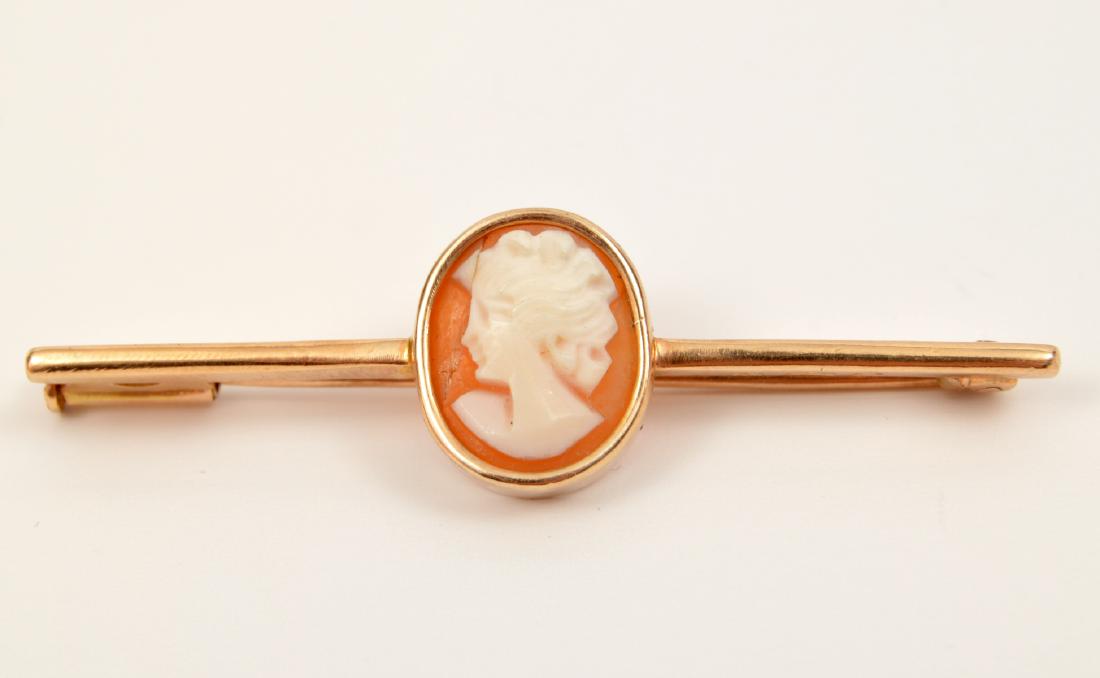 Victorian 14k Yellow Gold Cameo Bar Pin 4.1g: Victorian bar pin, with a shell cameo of a female profile, in a bezel setting. 4.1 grams. 1 7/8"L. Condition report: Very good -no issues. Please examine all photos closely. Contact C. Biddle Auction 