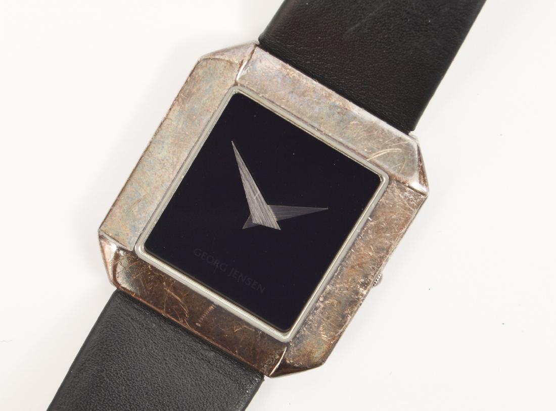 Georg Jensen Sterling Vintage Watch: Vintage Georg Jensen sterling silver square watch with black face. Denmark. Water resistant, 2363, Allen Scharff, Swiss made 47723. Broken Band. 1.25" x 1.25". Condition report: Good, Needs new band, 