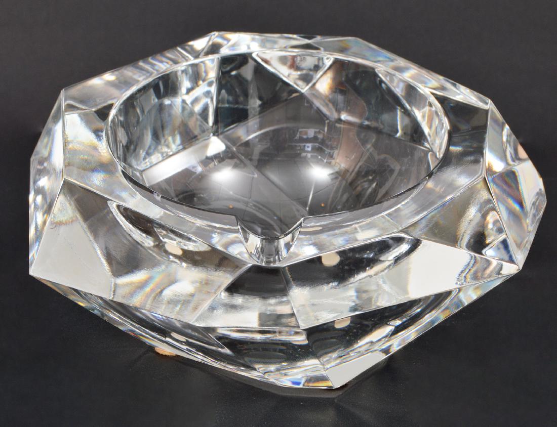 Vintage Baccarat Faceted Diamond Cut Ashtray: Vintage Baccarat, faceted diamond cut crystal ashtray. 3.75"H x 6.75"D. Condition report: minor fleabite to edge. Otherwise very good. Please examine all photos closely. Contact C. Biddle Auction Gall