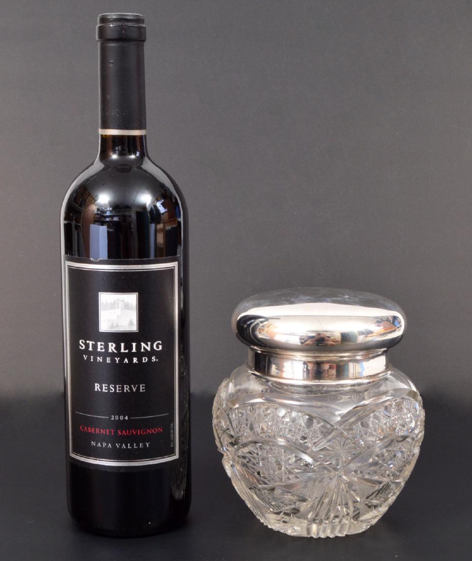 Vintage 800 Silver Cut Glass Lidded Jar: Vintage cut glass jar, with 800 silver trim and lid. Lid weight: 122.6 grams. 4.5"H. Hallmarked but illegible. Condition report: Very good - no issues. Please examine all photos closely. Contact C. Bi