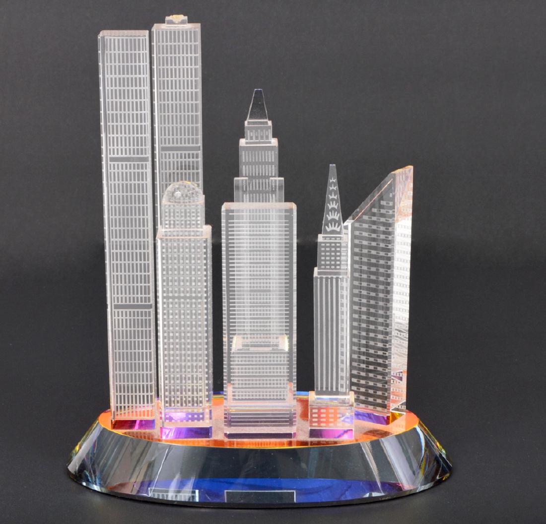 Crystal Cityscape Iridescent NY Pre 911 Skyline: High quality crystal cityscape or New York pre 911. 6.5"Hx6"Lx3.25"W. Condition report: Very good- one antenna pole on top of one tower is broken off. Please examine all photos closely. Contact C. Bid
