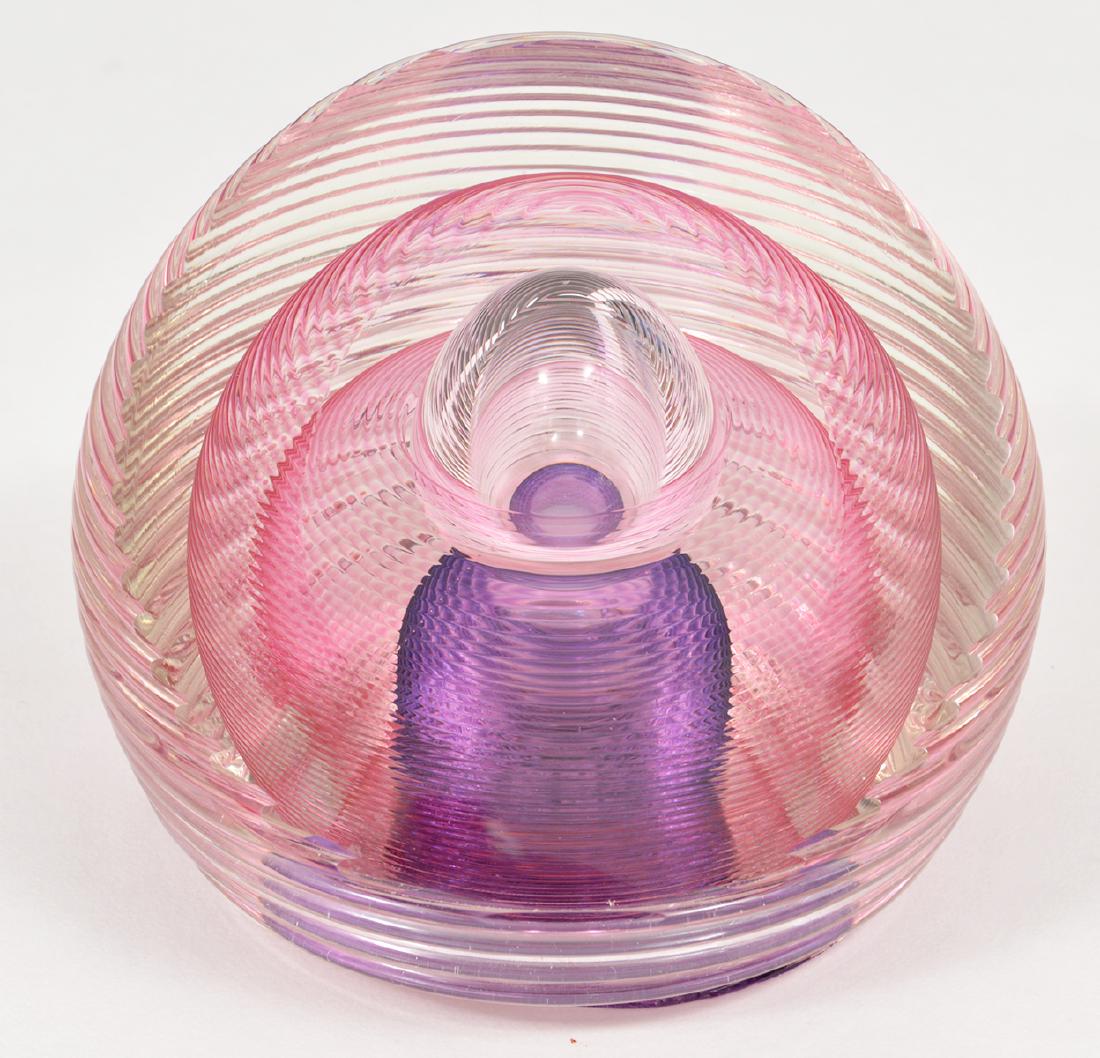 Kit Karbler & Michael David Art Glass Paperweight: Kit Karbler & Michael David lavendar art glass paperweight with a perfume bottle shape inside. Signed on bottom. 4"D. Condition report: Good- a couple of extremely tiny chips on bottom edge. Please ex