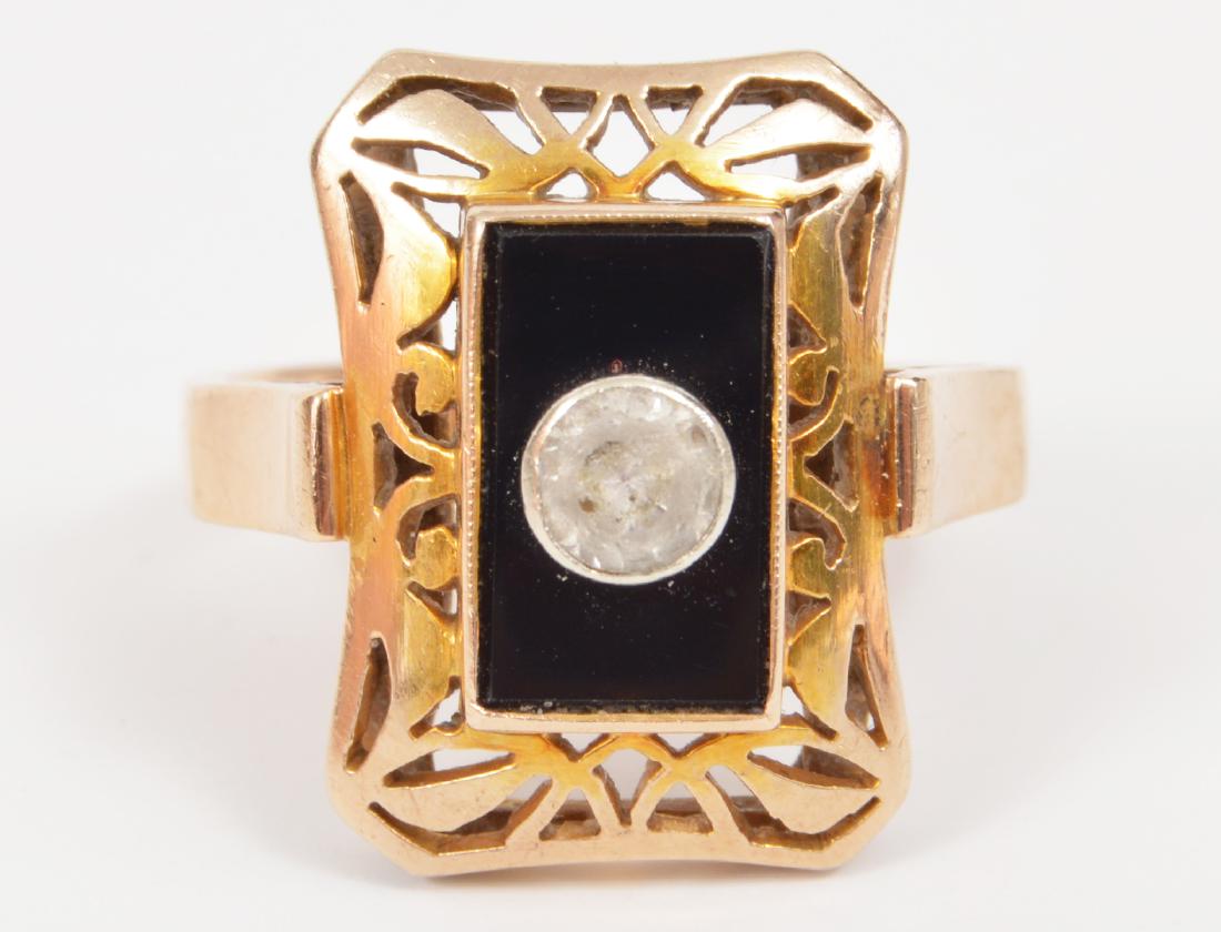 Victorian 14k Yellow Gold Onyx & Paste Ring 7.5: Victorian onyx ring, accented with a bezel set paste stone, in an open pierced mount. 14k yellow gold. Size: 7.5. 6 grams. Condition report: Good- paste stone is very scratched. Onyx and ring is in ve