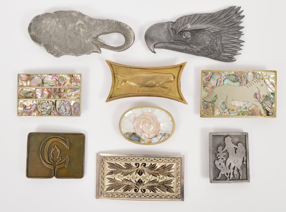 9 Belt Buckles Mexican Abolone Sandy Val: 9 Beardsley belt buckles: A) Elephant head: pewter by Sandy Val, 5.25" L. B) Eagle's head" metal, 5"L. C) Textured etched: rectangle, 4.25"L. D) Erotica: Indiana Metal Craft, Beardsley, 2.5"Lx2"H. E.)