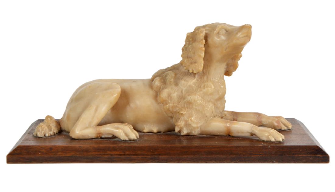 Antique Alabaster Dog 19th c.: Antique alabaster Dog on wood base. 5"Hx13.25"Lx5.5"W. Condition report: Fair, multiple repairs. Please examine all photos closely. Please examine all photos closely. Contact C. Biddle Auction Gallery