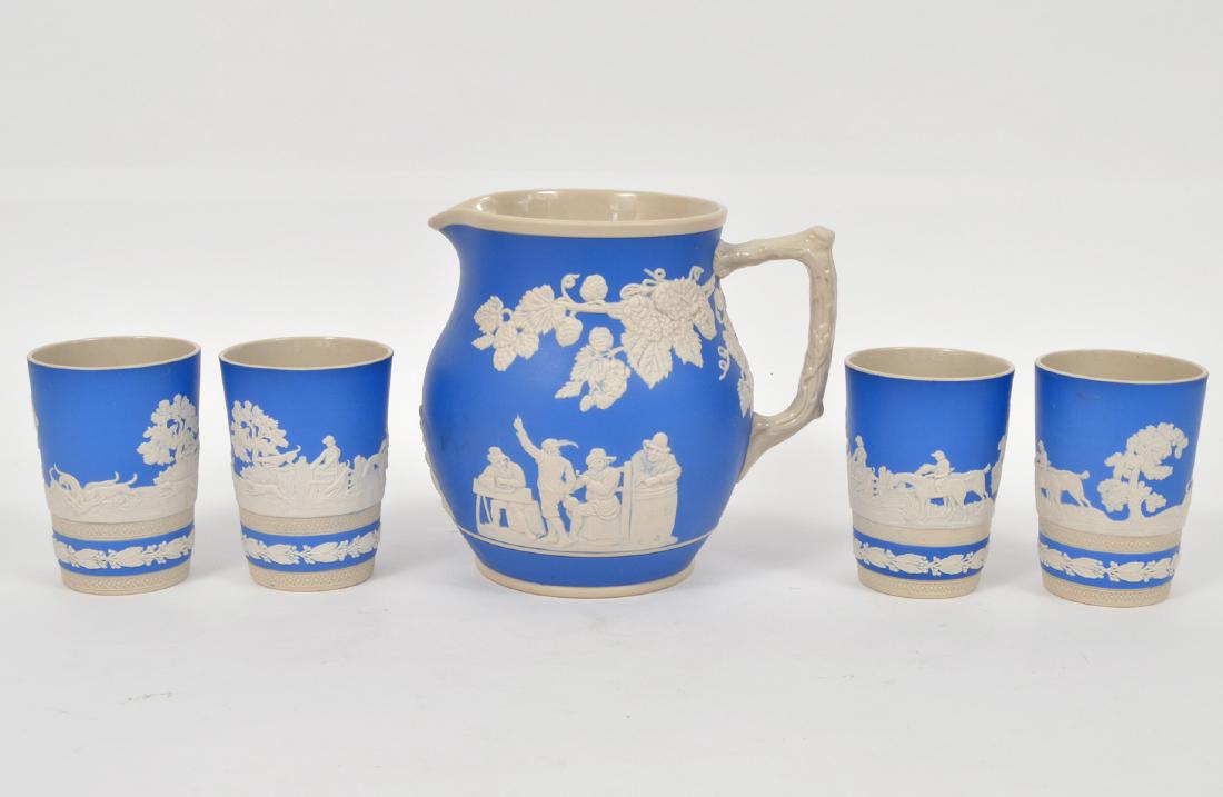 Copeland Spode Blue Jasperware Pitcher & 4 Cups: Copeland Spode England blue jasper ware. Pitcher has gathering scenes and vines - 6.75"H, 4 Cups have a hunting scenes - 4"H. Condition report: Very good no chips cracks or other issues. Please examin