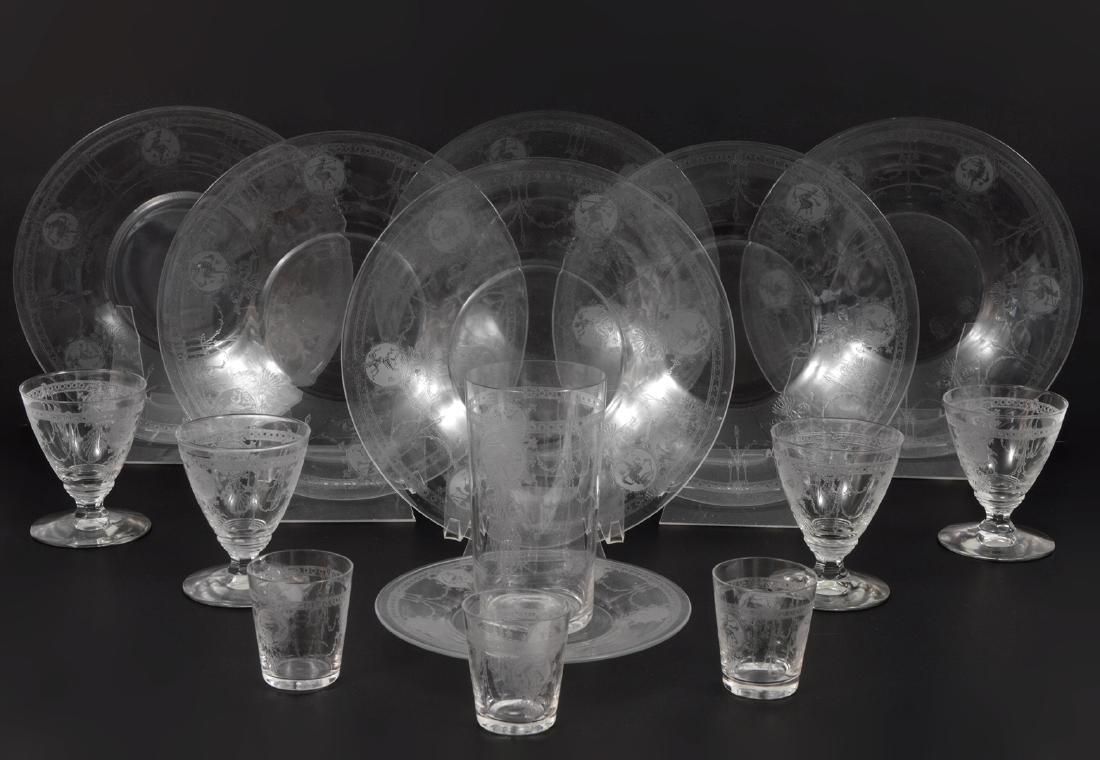11 Heisey Pied Piper Cordials Plates Glasses: 11 Heisey Pied Piper clear etched glass pieces including: 7- Cordial Glass - 3 7/8"H. 3- shot glasses - 2.25"H, 1- water glass - 5"H, 1- bread plate - 6.25"D, 6 -dinner plates - 8.5"D. Condition: Very