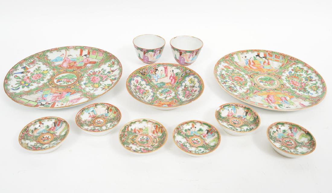 11 Chinese Famille Rose Medallion Bowl Plates: Butter Pats 11 Chinese Rose Medallion pieces including: 6 butter pats - 3"D, 1 small serving bowl - 5.5", 2 lunch plates - 8.5". 2 tea cups - 3"H. Condition report: Commensurate with age - few small f