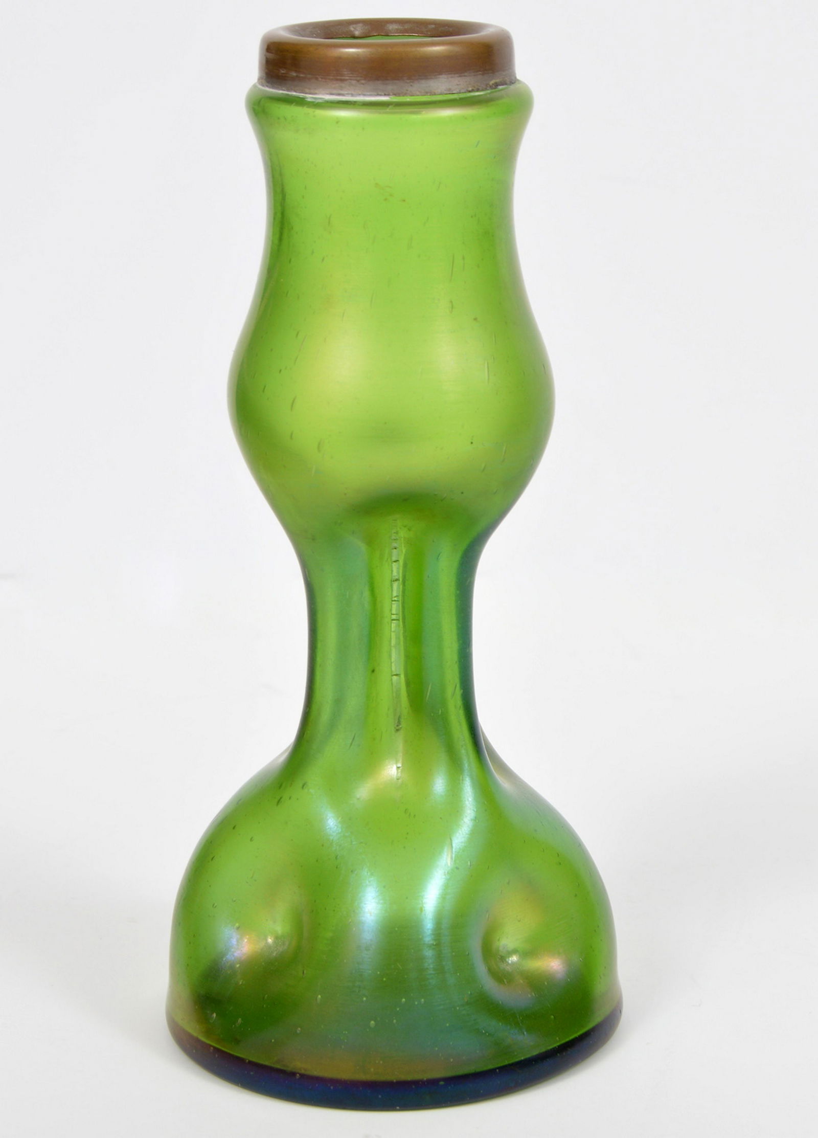 Green Glass Vase Loetz Style: Green Glass vase in the style of Loetz featuring a pinched, thumbprint design with a metal trim. 6.25"H. Condition report: Very good - no chips, cracks or other issues. Please examine all photos close