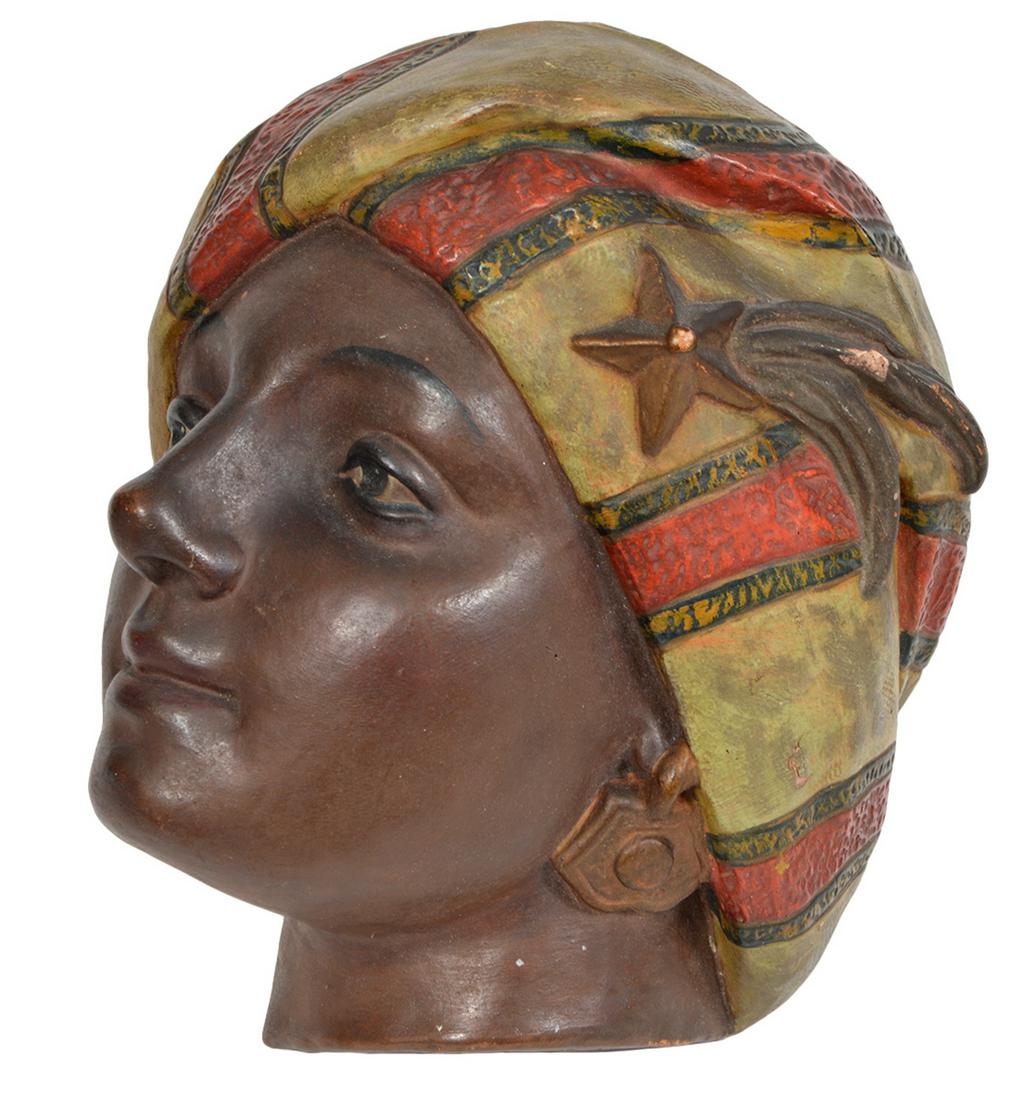 Terra Cotta Arab Mask Wall Plaque: Antique Terra Cota Arab Mask wall plaque. Marked on bottom 1901 A. A. P. Co. 10"L x 9.5"W. Condition report: Several chips. Please examine all photos closely. Contact C. Biddle Auction Gallery for mor