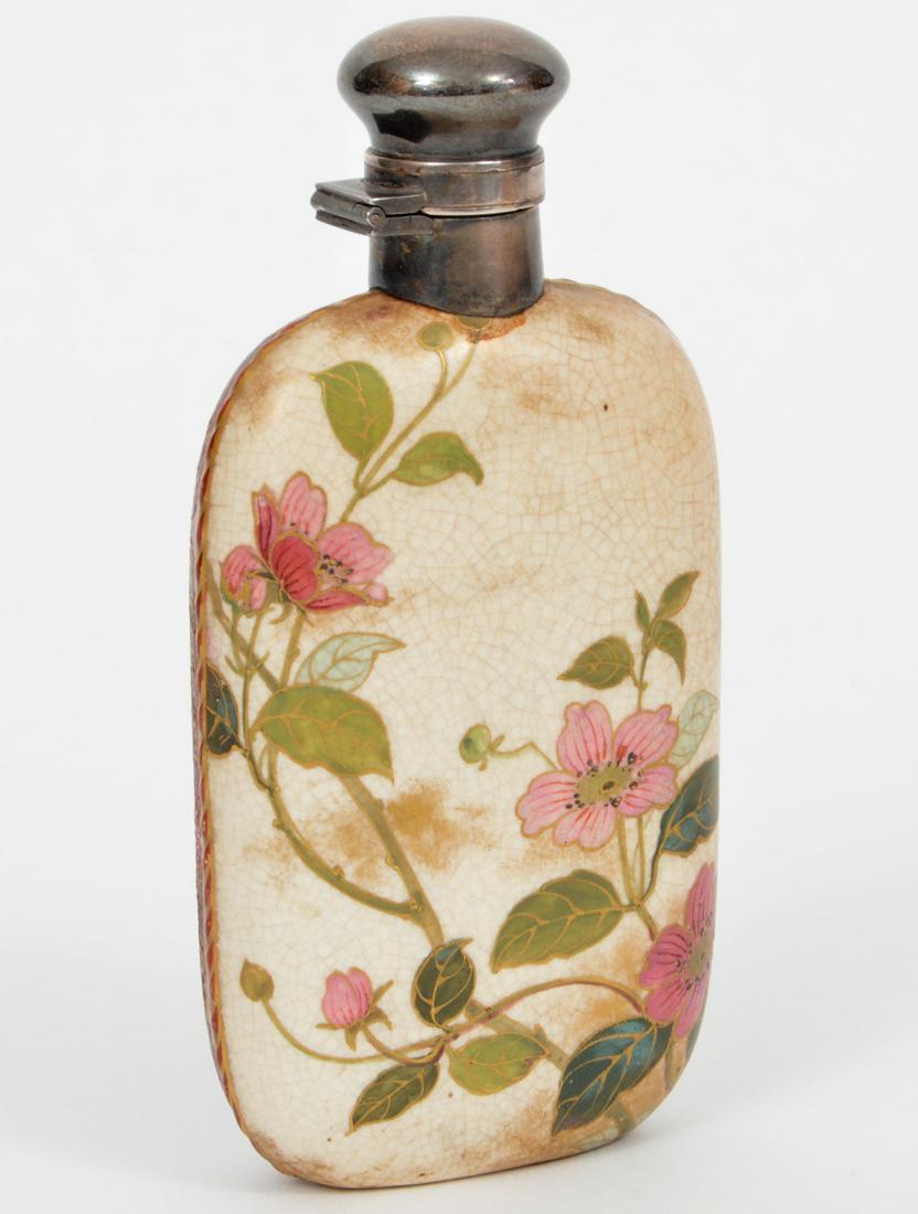 Royal Doulton Burslem Porcelain Flask: Royal Doulton Burslem flask with a floral pattern with turn locking top. 5.25"Hx2.75". Condition report: shows signs of age and wear - no cracks or chips. Please examine all photos closely. Contact C.