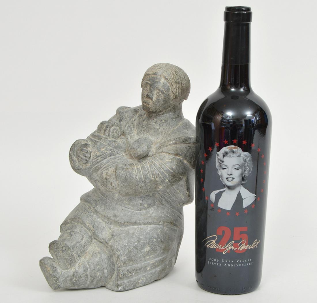 Inuit Soapstone Carving of Mom & Baby: Inuit soapstone carving of a mom holding her swaddled baby. 10"Hx7.5"x5"W. Signed' Ivuyivik' on bottom. Condition report: Very good - no issues. Please examine all photos closely. Contact C. Biddle Au