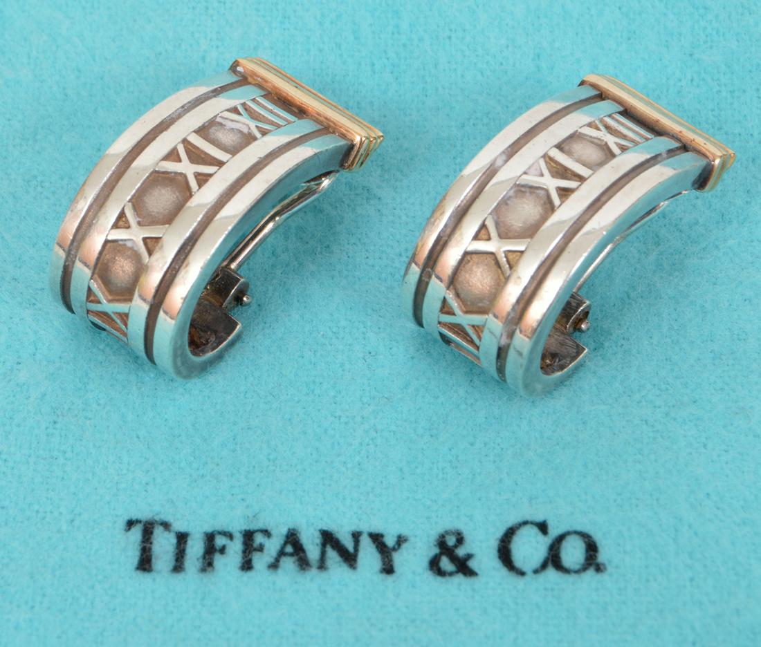 Tiffany Atlas Roman Numeral Sterling Earrings: Tiffany & Co sterling silver Atlas Roman numeral pierced earrings with omega backs. 16.8 grams. 1"L. Condition report: Very good - no issues. Please examine all photos closely. Contact C. Biddle Aucti