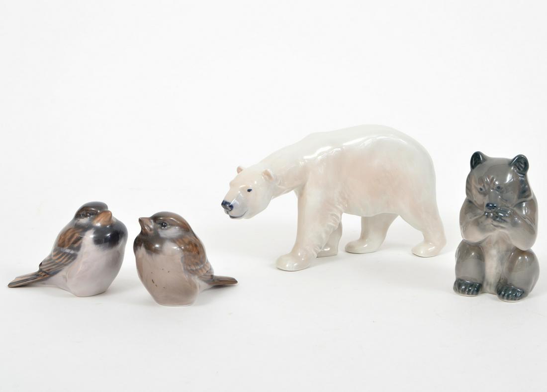 4 Pcs. Royal Copenhagen Porcelain: Royal Copenhagen porcelain polar bear (3.75"H x 7"L); sitting bear (3.75"H x 2.75"W); 2 sparrows (2.25"H x 3"L each). Condition report: good overall condition, see photos. Please examine all photos cl