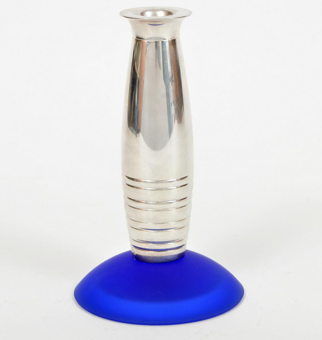 Christofle S/P Candlestick Frosted Green Blue Base: Modernist Christofle silver plate candlestick with frosted blue glass base. With original box no lid. 6"H x 3.5"W. Condition report: Very good, no issues. Please examine all photos closely. Contact C.