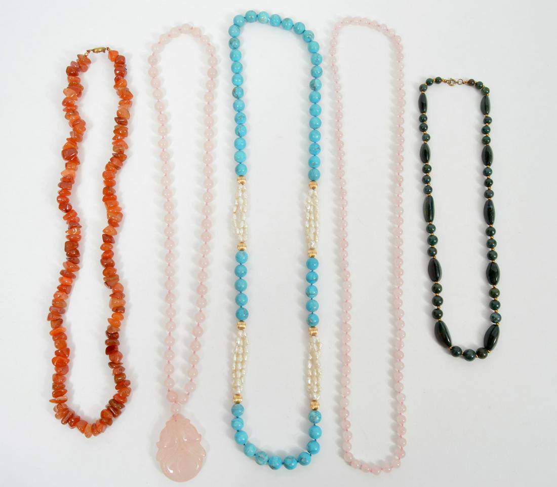 5 Necklaces Rose Quartz Turquoise Blood Stone: 5 strand necklaces: a 28" strand of carnelian nugget, a 36" strand of 8mm rose quartz, a strand of 10mm rose quartz beads with a 2.25" carved floral pendant, a 36" strand of dyed turquoise and freshwa
