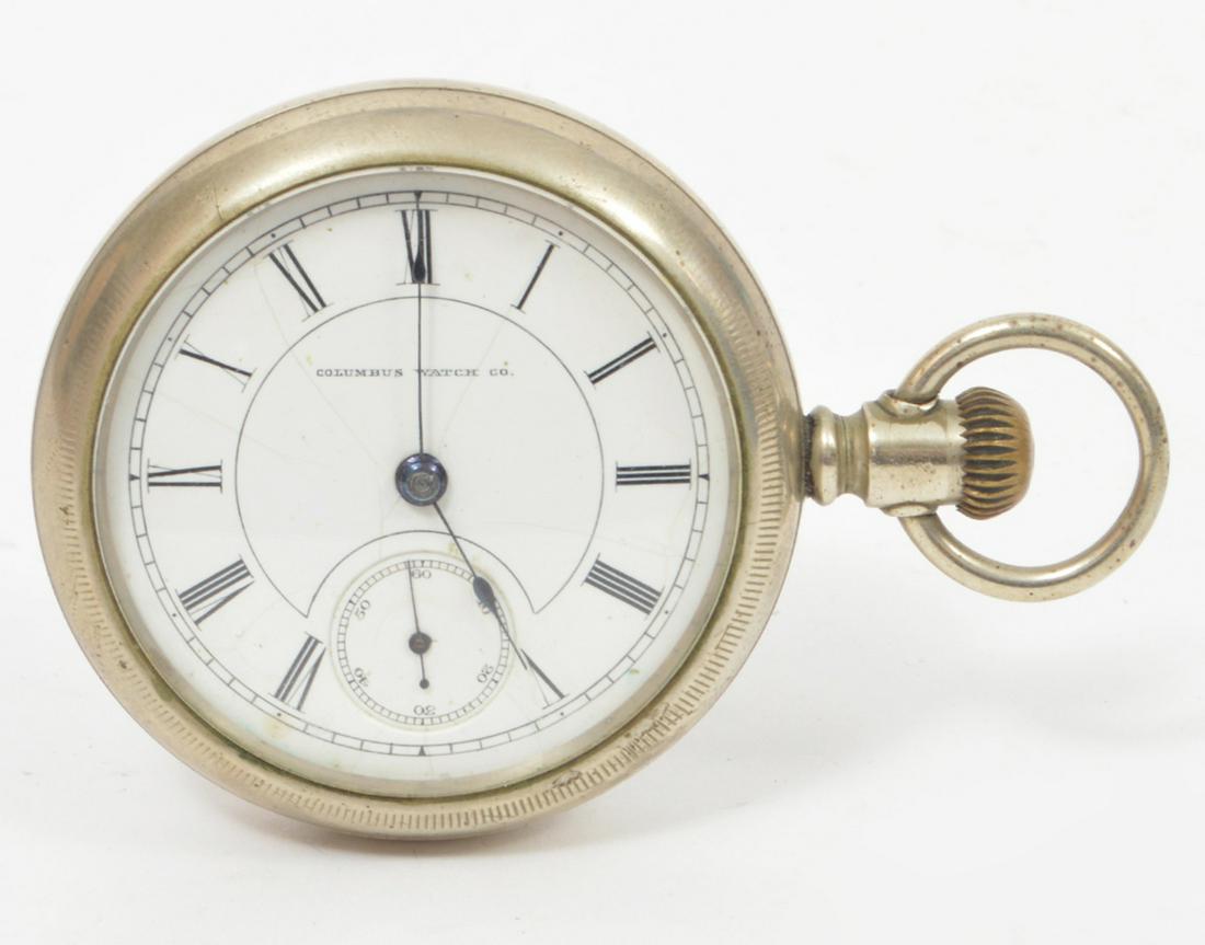 Antique Columbus Watch Co Pocket Watch: antique Columbus Watch Co pocket watch. Wind up. Inside is marked: Fahys Oresilver No 1. White Face with roman numeral markers. 2.25" diameter. Condition report. Not running, hour hand is slightly ben