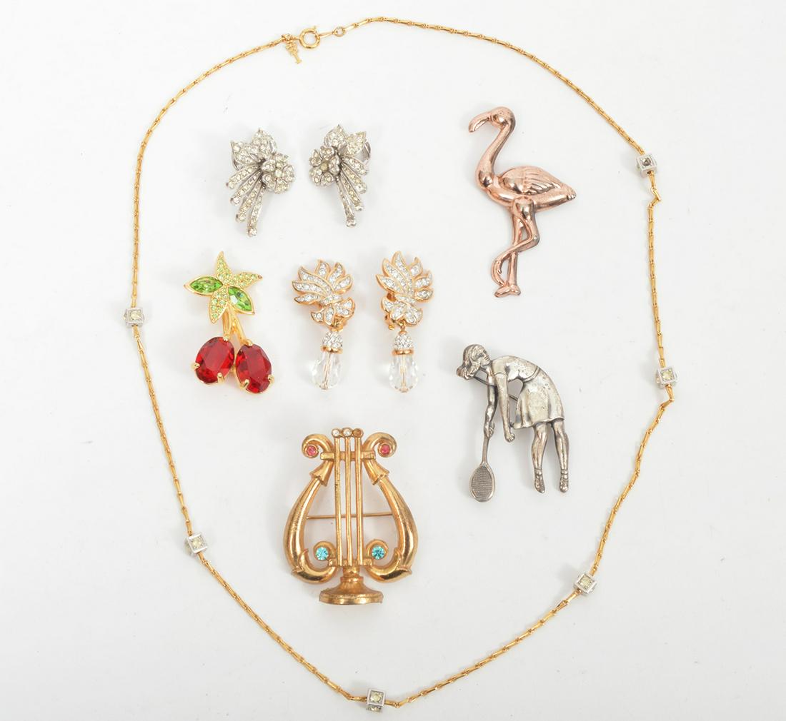 Vintage Designer Jewelry Coro Trifari Swarovski: Vintage designer jewelry lot: Coro - a jeweled lyre, a pink gold tone flamingo and a pair of clip on crystal floral earrings, Trifari - a silver tone girl tennis player and a 22" gold tone chain and c