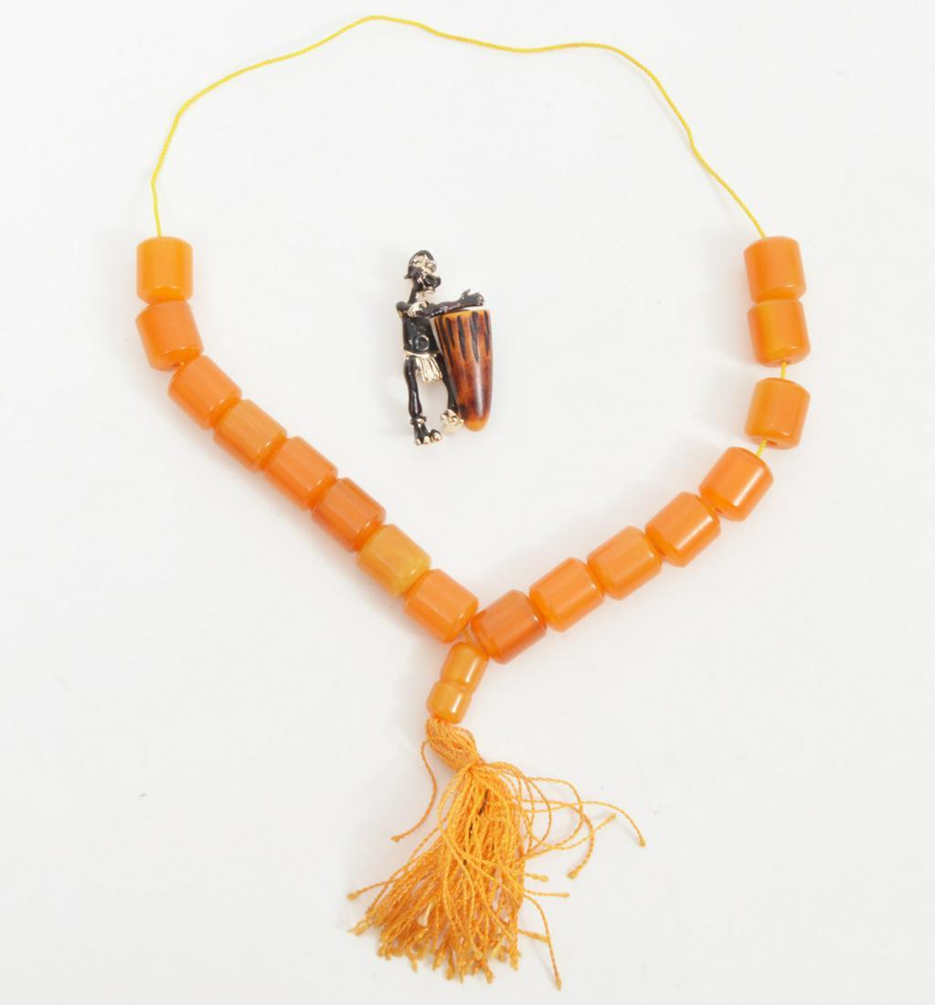 Bakelite Drummer Brooch & Prayer Beads (1 of 5)