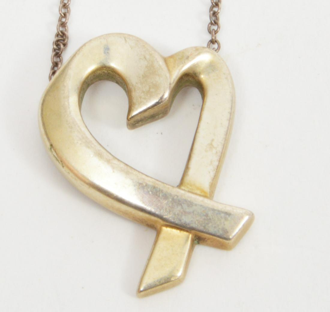 Tiffany & Co Paloma Picasso Sterling Necklace: Tiffany & Co Paloma Picasso sterling silver heart necklace. 18"L, pendant - .75"L. 4.5"L. Signed Paloma Picasso. Condition report: Very good - no issues. Please examine all photos closely. Contact C. 